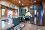 Fully Equipped Kitchen Features Stainless Steel Appliances
